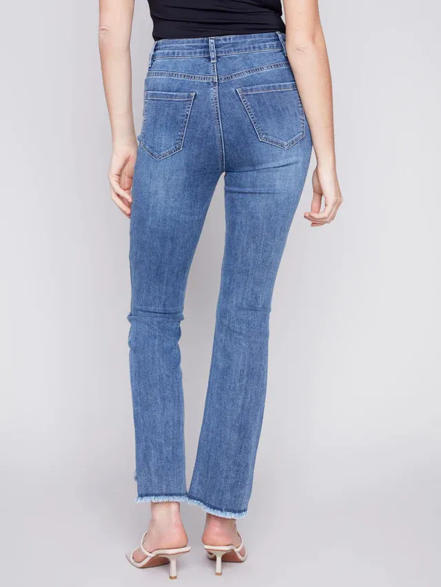 BOOTCUT JEANS WITH ASYMMETRICAL HEM