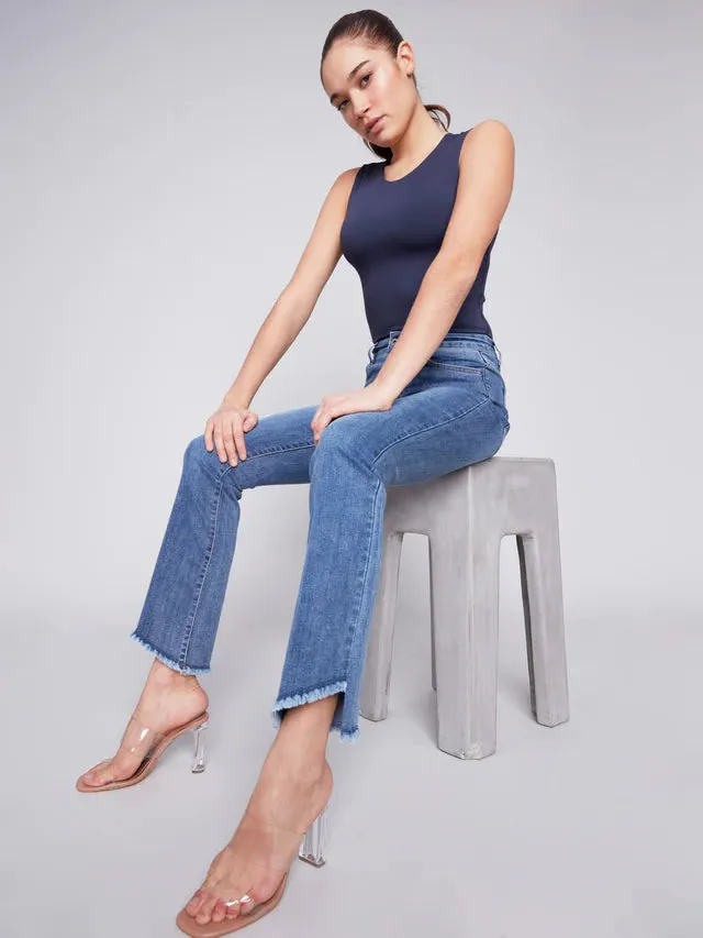 BOOTCUT JEANS WITH ASYMMETRICAL HEM